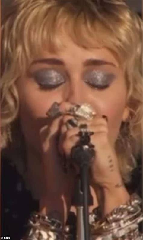 Miley Cyrus Fights Back Tears While Performing Her Hit Wrecking Ball At