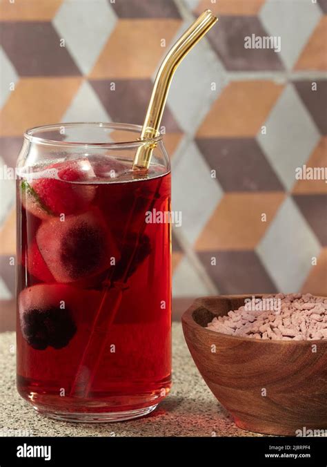 A Glass Of Iced Fruit Tea Made From Instant Tea Granules Stock Photo