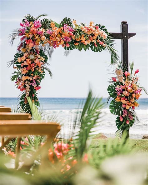 When The Bride Has Her Heart Set On A Lush And Tropical Wedding Ceremony Arch And Dellables More