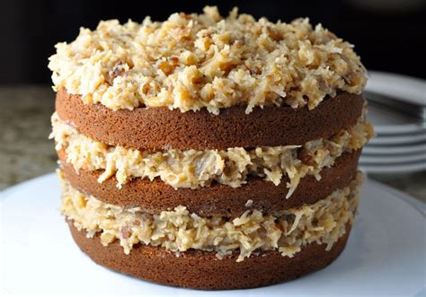 Frosting on the german chocolate cakes before,due to too much coconut too sweet etc. Sweet German Chocolate Cake | More Sweets Please