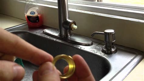 Instead the wole sink strainer assembly is rotating when you tap on the nut to try to turn it. How to Fix a Leaky Kitchen Faucet Pfister Cartridge - YouTube