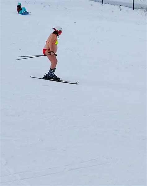 Heavily Pregnant Woman In Bikini Goes Skiing