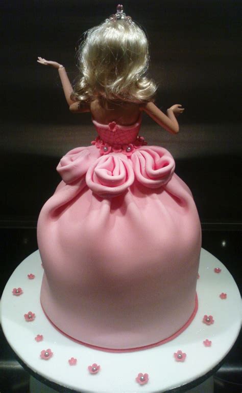 With every twirl and swirl of intricate designs our baker has input, you'll be in awe that it's actually not a real dress! Princess Doll Cake - CakeCentral.com