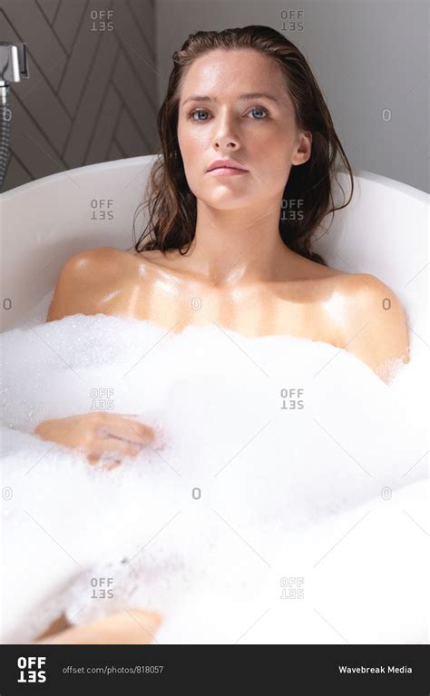 Close Up Of Beautiful Woman Bathing In The Bathtub In Bathroom Stock