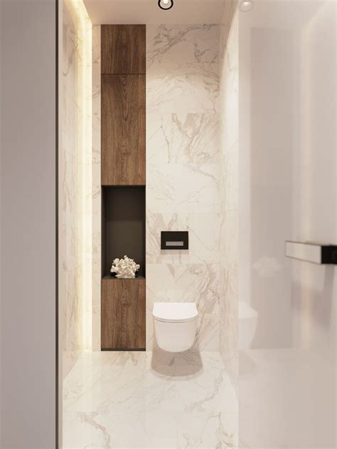 It can be there to catch your eye. marble bathroom with wood niche | Badezimmer, Toiletten ...