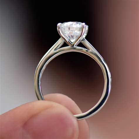 Round Brilliant Cut Diamond Solitaire Engagement Ring With Channel Set