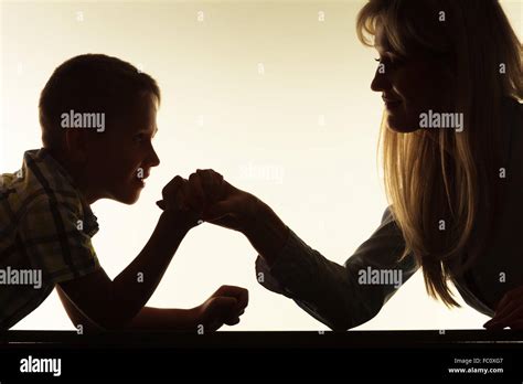 Mother And Son Arm Wrestling Stock Photo Alamy