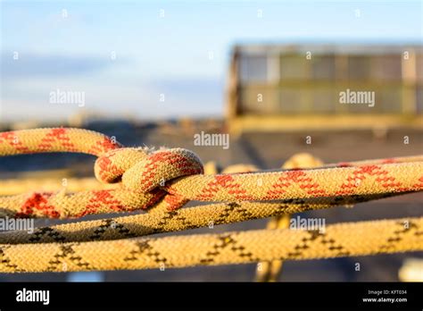 Closeup Stretched And Tied Industrial Braided Rope Stock Photo Alamy
