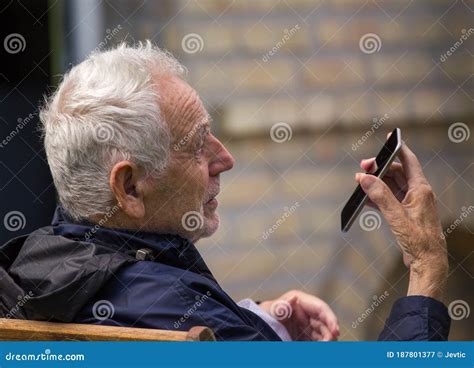 Old Man Talking On Mobile Phone Stock Image Image Of Conversation