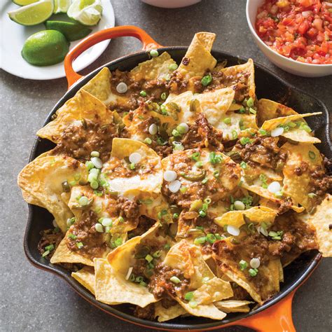 Is there anything more satisfying than a loaded tray of nachos, still hot from the oven? Cast-Iron Loaded Beef Nachos | America's Test Kitchen