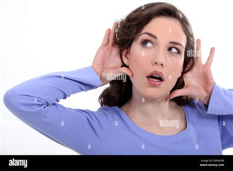 Woman Listening Something Carefully Stock Photo Alamy