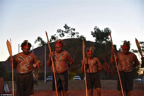 aboriginal australians dance in traditional dress at uluru daily mail online