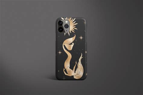 A Phone Case With An Image Of A Mermaid And Stars On The Back In Gold