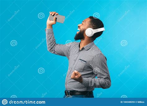 Afro Man Singing Using Smartphone As Mic Stock Image Image Of