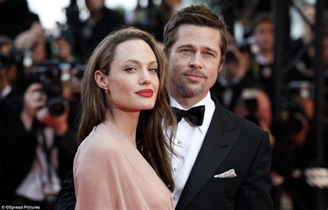 Angelina Jolie In Versace Wedding Dress With Brad Pitt In
