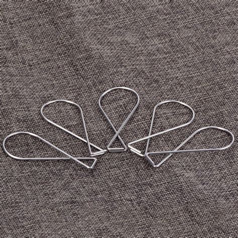 A dropped ceiling is a secondary ceiling, hung below the main (structural) ceiling. Outus 100 Pack Ceiling Hook Clips TBar Squeeze Hangers ...