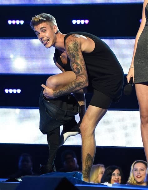 Justin Bieber Shirtless During Fashion Rocks Photos POPSUGAR Celebrity Photo