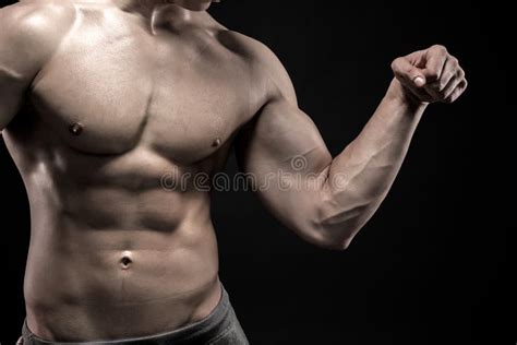 Close Up Of Man Flexing Showing His Triceps Biceps Muscles Stock Photo