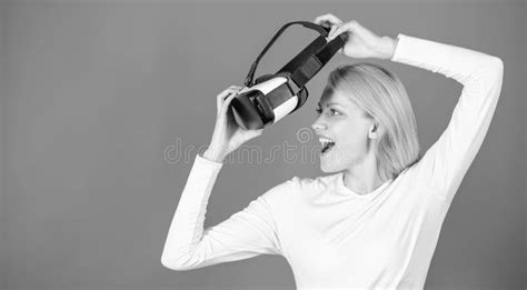 Portrait Of Young Woman Wearing Vr Goggles Experiencing Virtual Reality Using 3d Headset Woman