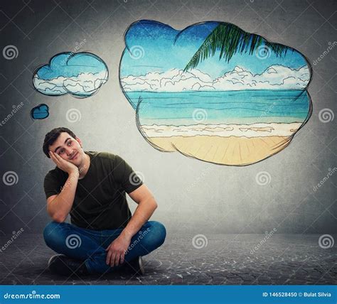 Guy Dreamer Imagining A Exotic Seaside Beach Adventure Stock Photo