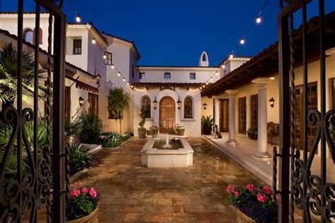 Hacienda mediterranean style house plans villa with courtyard best architecture mexican marylyonarts com. Hacienda Style Homes Courtyard With Wrought Iron Gate In Black Color Feat Paving Stone Deck And ...