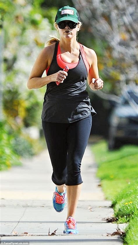reese witherspoon hits the streets in casual fitness gear for morning jog daily mail online