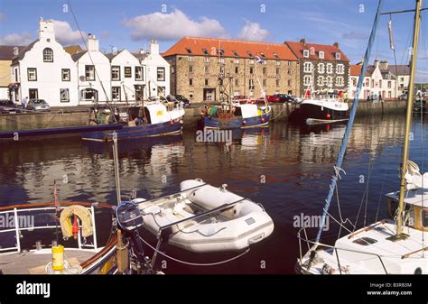 Fishing Boats And Yachts On A Quiet Still Morning In Scenic Eyemouth