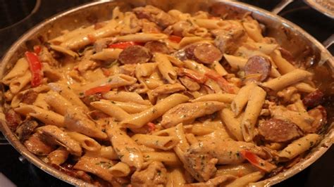 A splash of cream at the end adds a nice decadence to this meal. Cajun Chicken & Andouille Sausage Pasta - YouTube