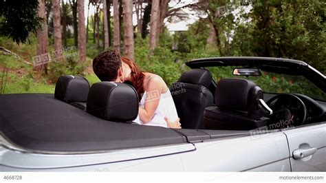 Romantic Couple Kissing In A Car Stock Video Footage 4668728