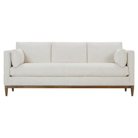 With easy to assemble instructions, this apartment sofa with skirt is a great way to quickly update your space. Leah Modern Bone White Upholstered Latte Wood Base Sofa ...