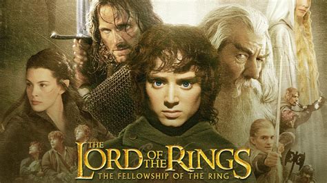 The Lord Of The Rings Movie Poster With Four Characters In Front Of