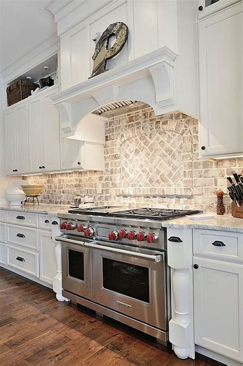 Inspire your design with these install a tile backsplash that uses an accent tile in navy or red on a cream or white background. 32 Kitchen Backsplash Ideas - Remodeling Expense