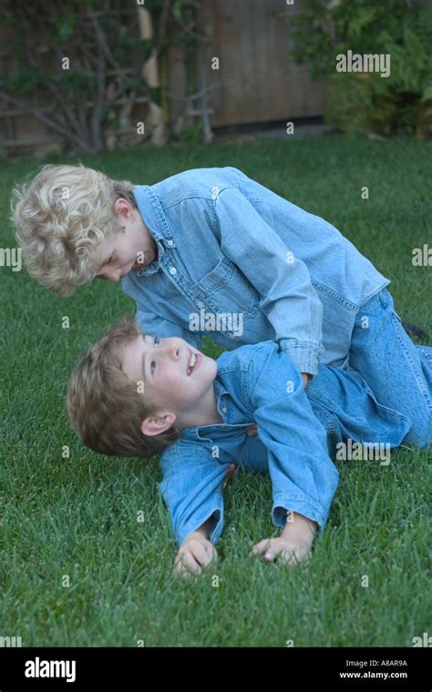 Mr Spes Two Young Brothers Play Wrestle With Each Other Stock Photo Alamy
