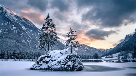 Snow Covered Island Lake Mountain In Alps Bavaria Germany