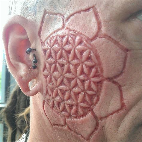 scarification - Google Search | Scarification tattoo, Inspirational