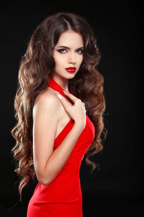 beautiful girl with long wavy hair in red dress brunette with c stock image image of haircut