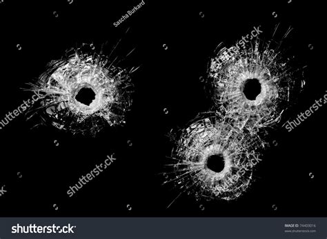 Bullet Holes In Glass Isolated On Black Bullet Holes From 40 Handgun