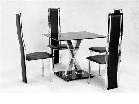 Check spelling or type a new query. Square glass dining table X chrome and 4 faux chairs ...