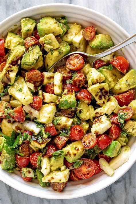 Add lettuce then generously drizzle with reduced balsamic vinegar. Caprese Avocado Salad Recipe with Mozzarella, Pesto ...