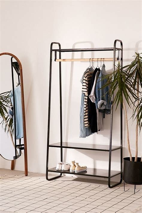 8 Ways To Store Your Clothes Without A Closet Huffpost Life