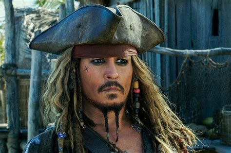 The curse of the black pearl. Movie review: 'Pirates of the Caribbean: Dead Men Tell No ...
