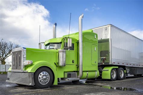 Classic American Big Rig Black Semi Truck With Semi Trailer For