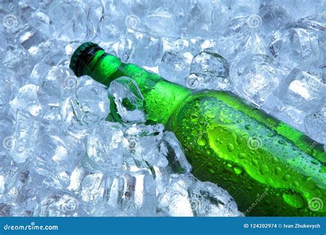 Bottle Of Beer In Ice Cubescloseupgreen Bottlehot Summer Fresh Drink