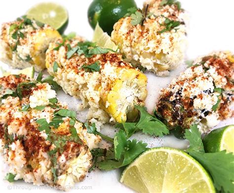 Lightly charred corn on the cob slathered in a creamy chili, lime sauce and topped with cilantro and cotija cheese is a great side to serve at any summer cookout. Charred Mexican Street Corn Recipe - Through Her Looking Glass
