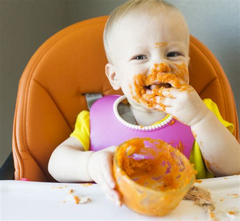 The Mess And Fun Of Starting Solid Foods Healthy Parenting Winnipeg