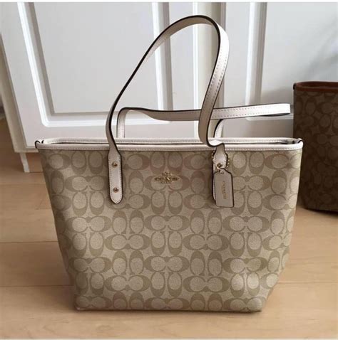 Guaranteed Authentic Coach City Zip Tote In Signature Coated Canvas