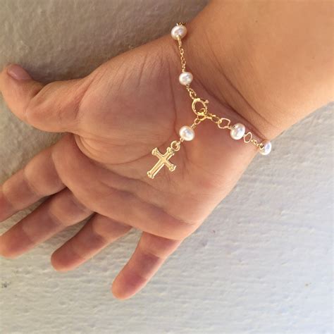 5 tips to buy gold bracelets for girls. Gold Cross Baby Bracelet, Baptism gift, Pearl Baby ...