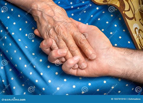 Hand Of Senior Woman Holding Man Hand Stock Photo Image Of Concept