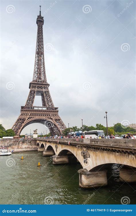 Eiffel Tower And Old Bridge Over Seine River Editorial Stock Image