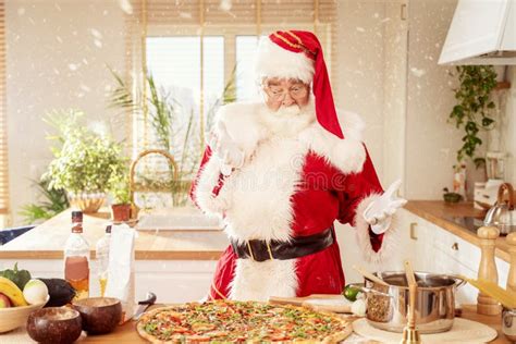 Santa Claus Making Italian Pizza In Kitchen Stock Photo Image Of